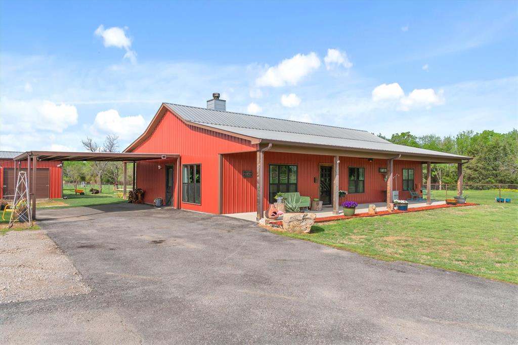 9292 County Road 346 Terrell, TX 75161 - Photo 7 of 40 a view of a house with sitting area and swimming pool
