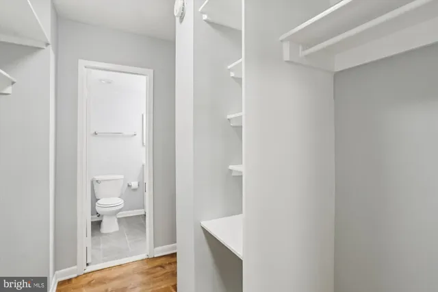 a view of a storage & utility room with washer and dryer