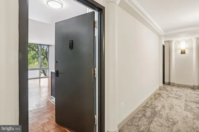 a kitchen with stainless steel appliances granite countertop a refrigerator stove and sink
