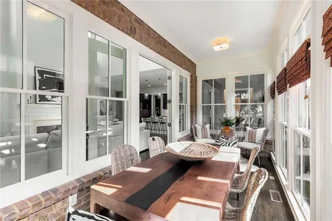 a bedroom with a bed and a table in it