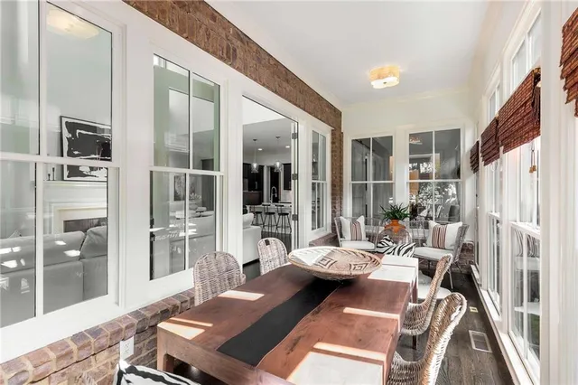 a bedroom with a bed and a table in it