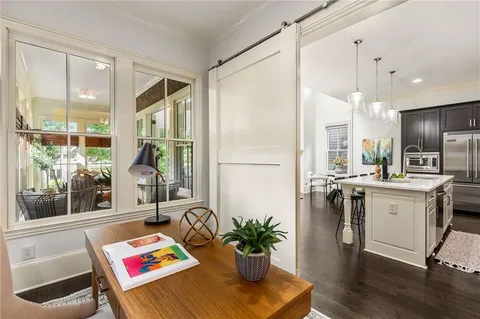 a bedroom with bed and a window