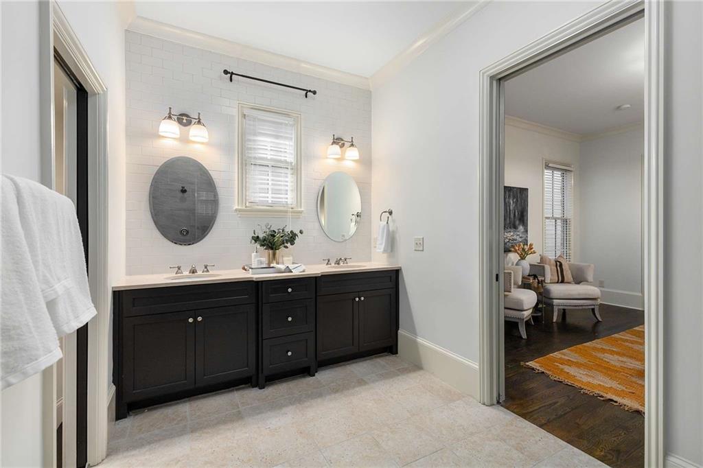 147 Hubbard Road Woodstock, GA 30188 - Photo 26 of 56 a spacious bathroom with a double vanity sink and a mirror