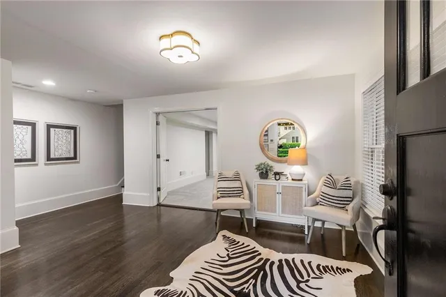 a living room with a couch and a table