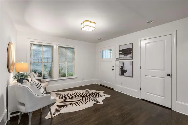 a bathroom with a double vanity sink mirror and shower