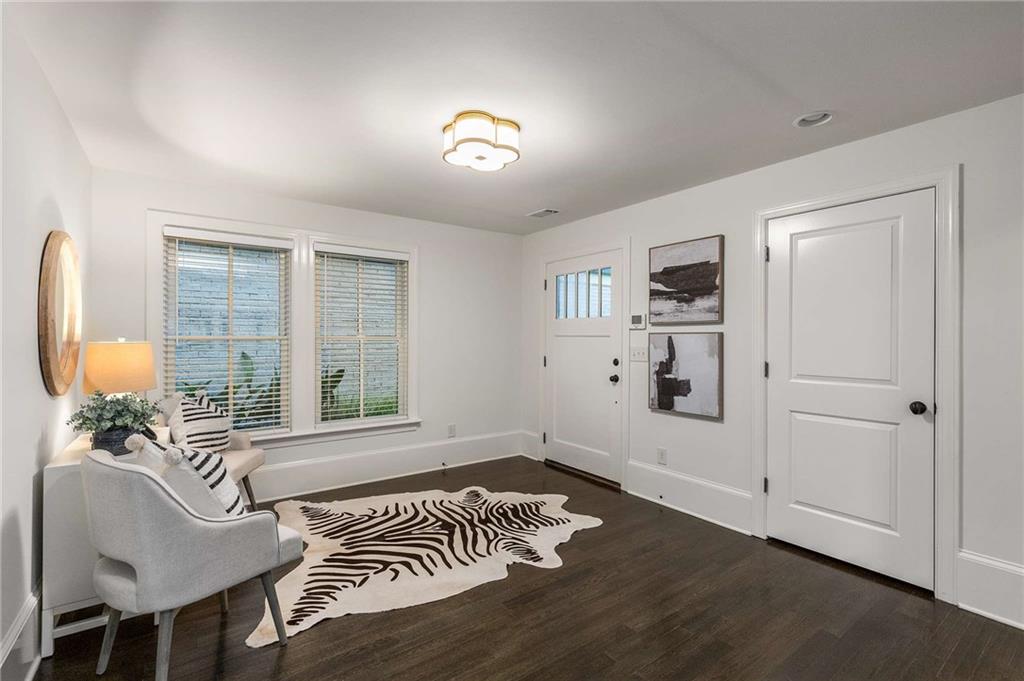 147 Hubbard Road Woodstock, GA 30188 - Photo 30 of 56 a room with furniture and windows