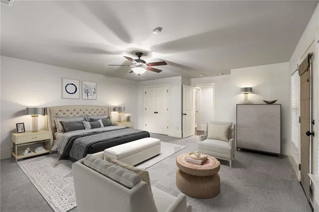 a view of a hallway with wooden floor and stairs