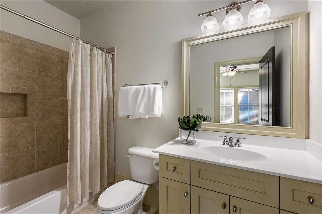 147 Hubbard Road Woodstock, GA 30188 - Photo 42 of 56 a bathroom with a sink a toilet and shower