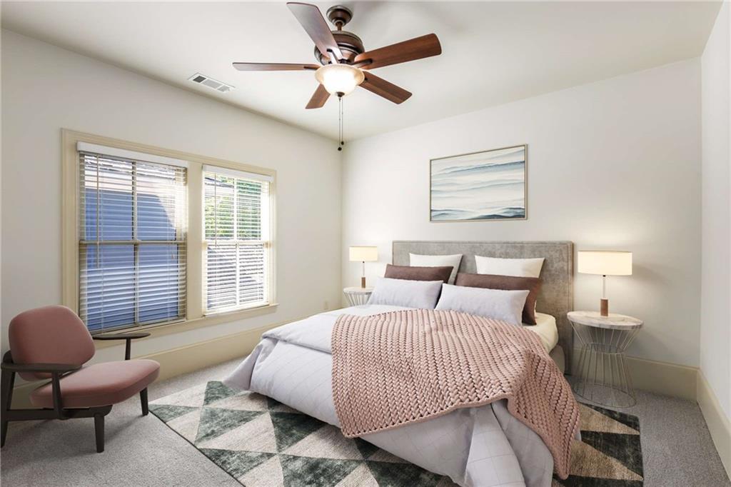 147 Hubbard Road Woodstock, GA 30188 - Photo 43 of 56 a bedroom with a bed chairs and window