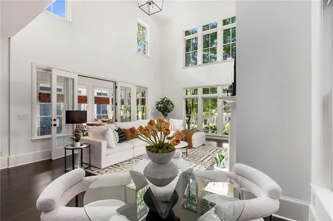 a kitchen with counter top space a sink stainless steel appliances and cabinets