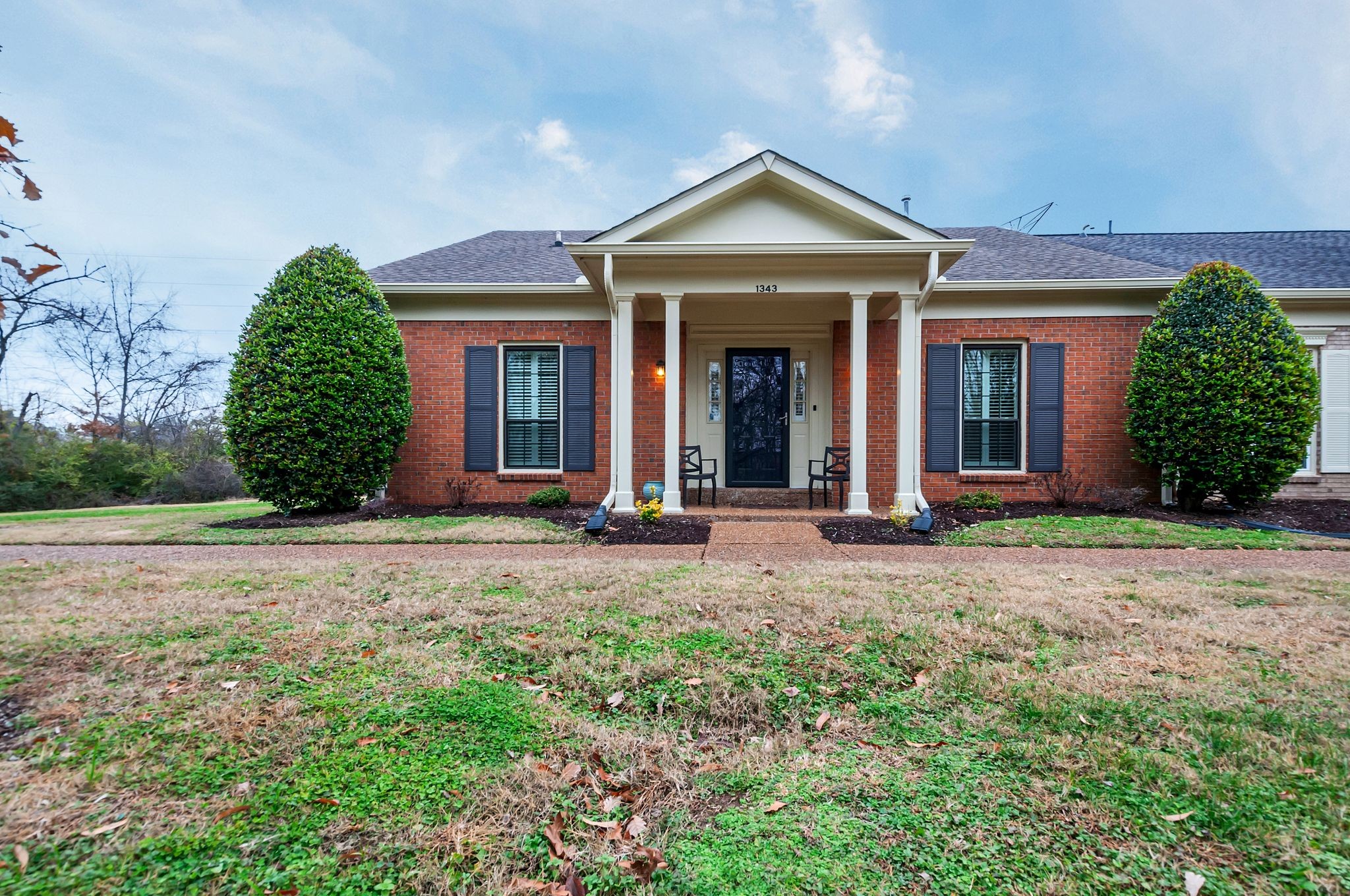 1343 General George Patton Road Nashville, TN 37221 - Photo 1 of 41 front view of a house with a yard