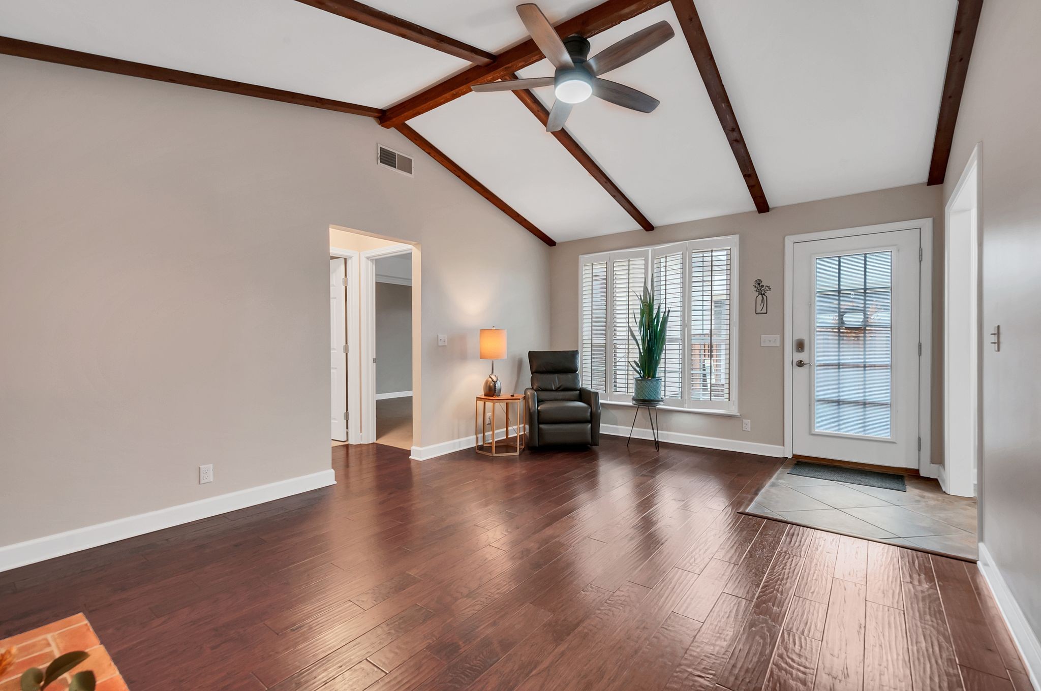 1343 General George Patton Road Nashville, TN 37221 - Photo 14 of 41 a view of an empty room with wooden floor and a window