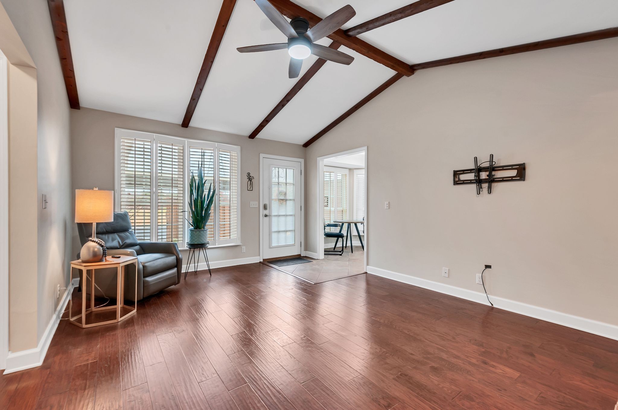1343 General George Patton Road Nashville, TN 37221 - Photo 16 of 41 a view of a livingroom with hardwood floor and a ceiling fan