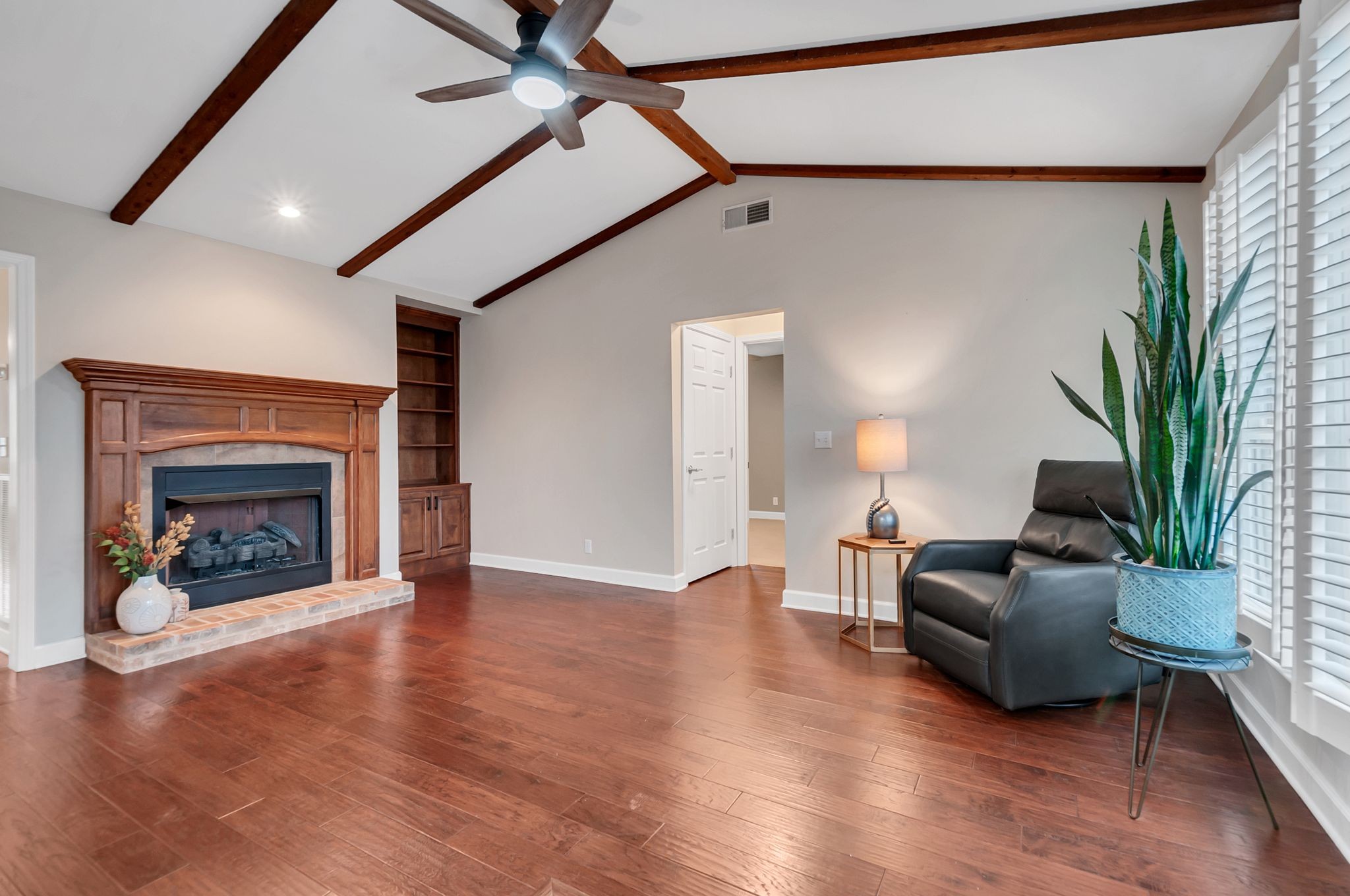 1343 General George Patton Road Nashville, TN 37221 - Photo 17 of 41 a living room with furniture and a fireplace
