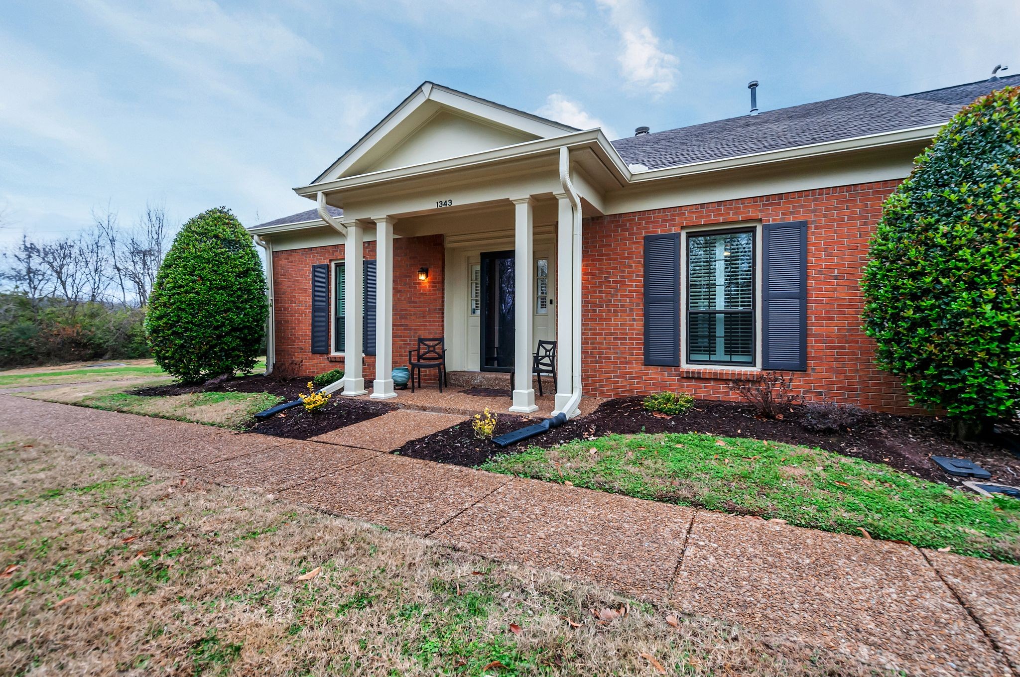 1343 General George Patton Road Nashville, TN 37221 - Photo 2 of 41 front view of the house and a yard