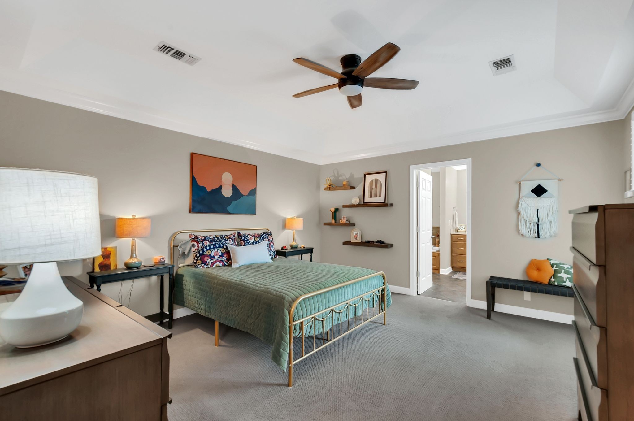 1343 General George Patton Road Nashville, TN 37221 - Photo 26 of 41 a bedroom with a bed and a chandelier