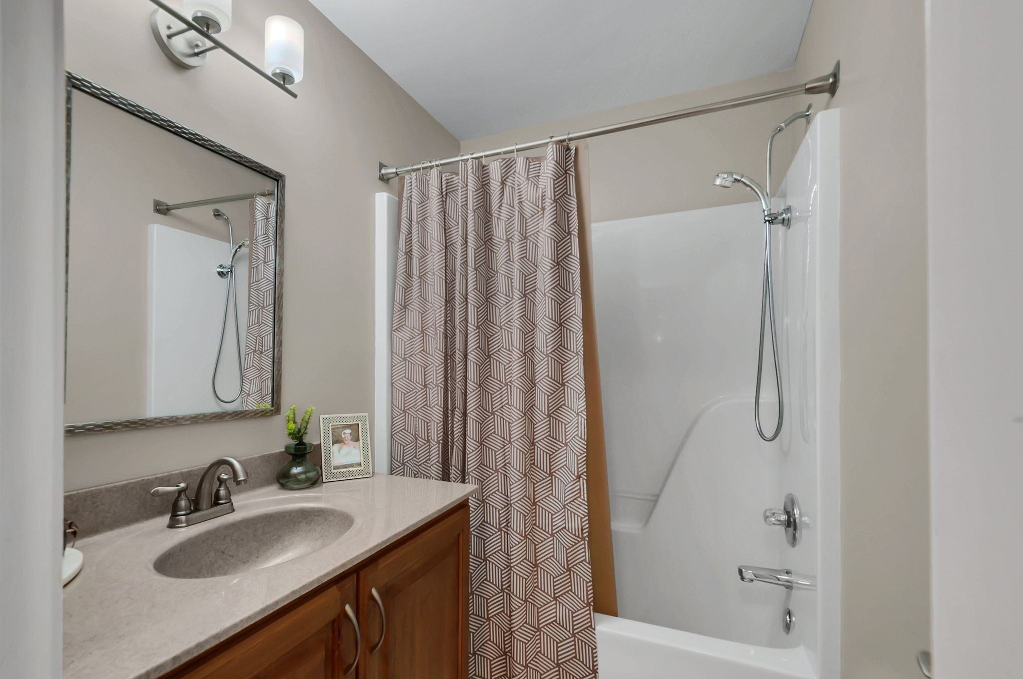 1343 General George Patton Road Nashville, TN 37221 - Photo 32 of 41 a bathroom with a sink vanity granite tub and shower