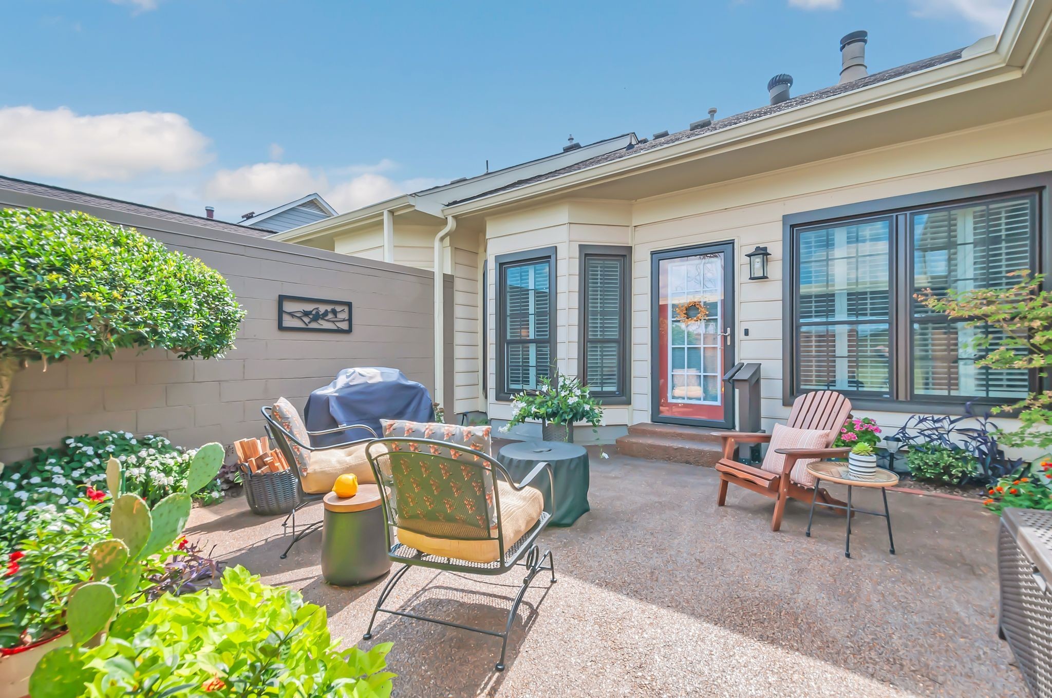 1343 General George Patton Road Nashville, TN 37221 - Photo 41 of 41 a view of a patio with table and chairs and potted plants