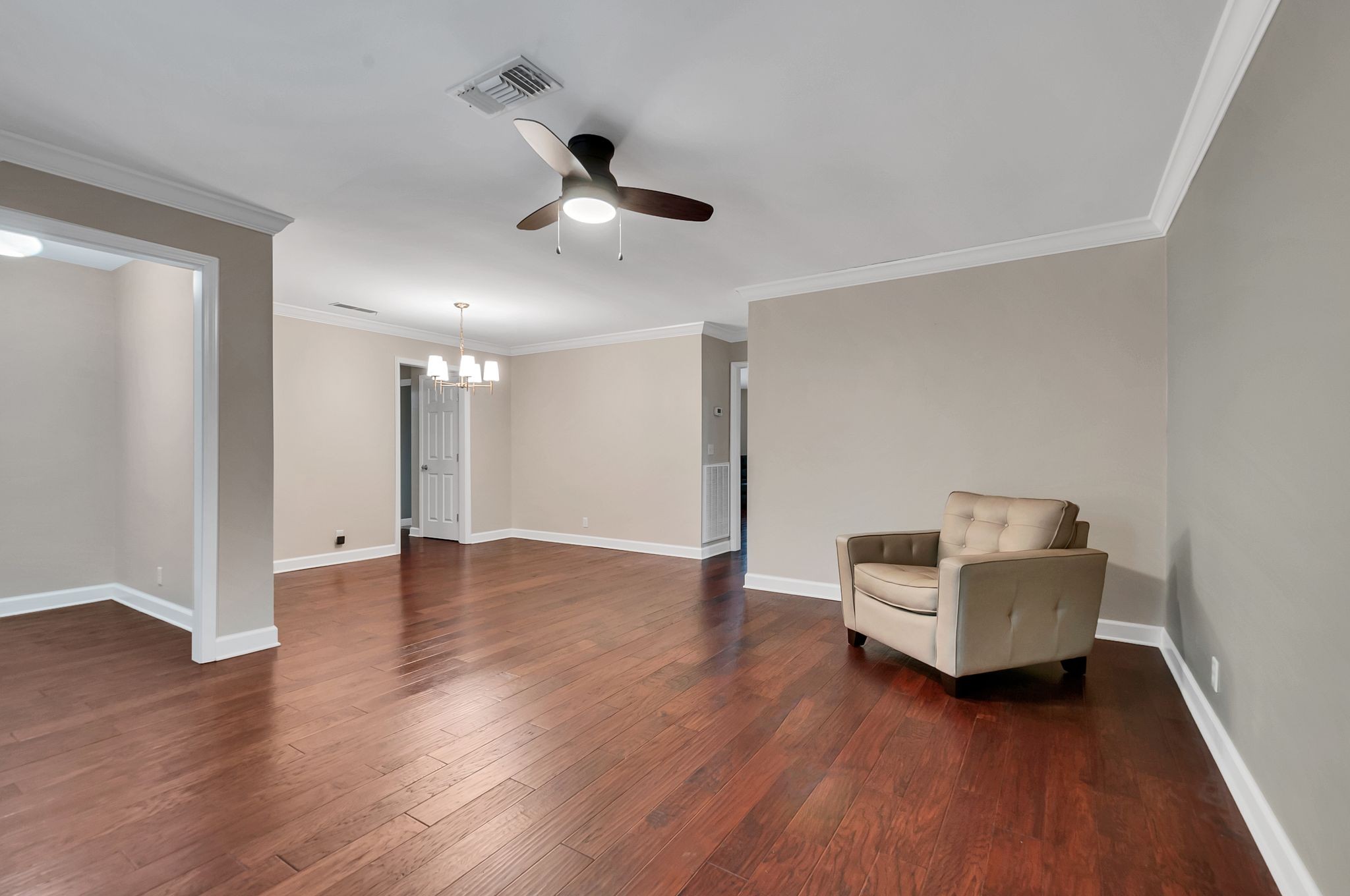 1343 General George Patton Road Nashville, TN 37221 - Photo 9 of 41 a view of an empty room with wooden floor and a window