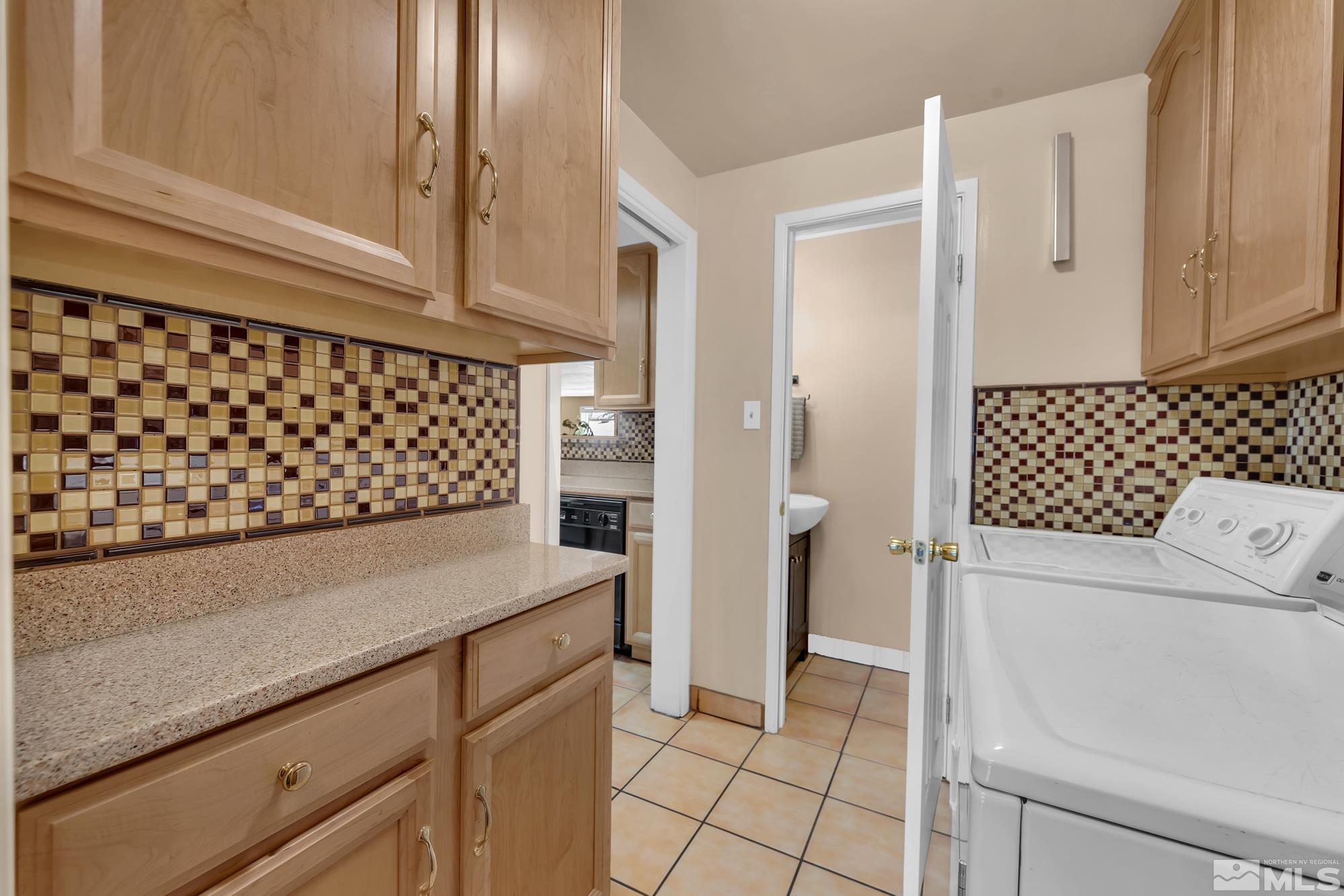 1830 West 7th Street Reno, NV 89503 - Photo 17 of 36 a view of a storage and utility room with washer and dryer
