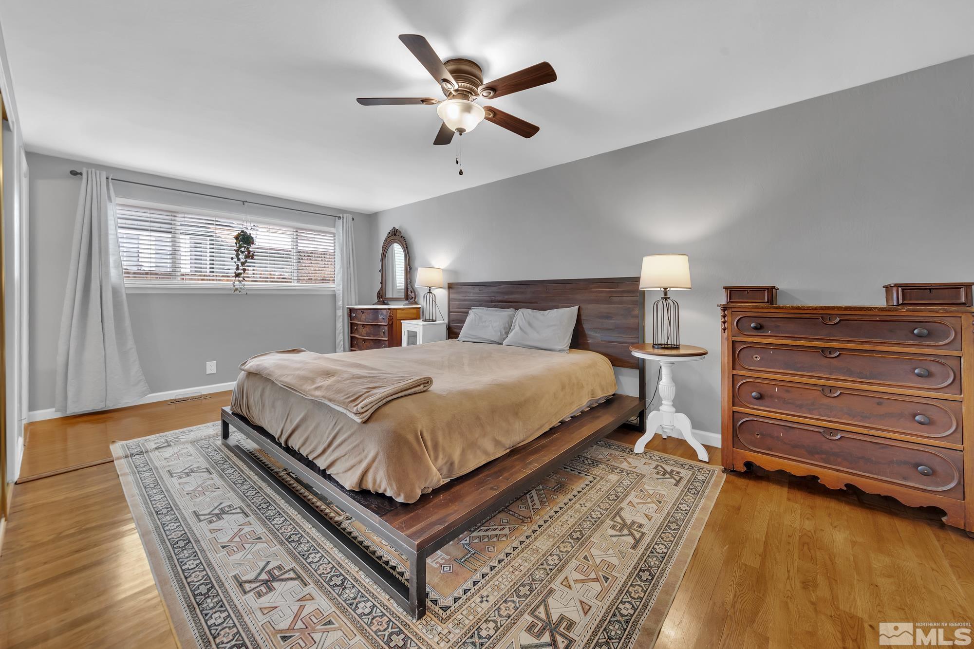 1830 West 7th Street Reno, NV 89503 - Photo 20 of 36 a bedroom with a bed and a dresser