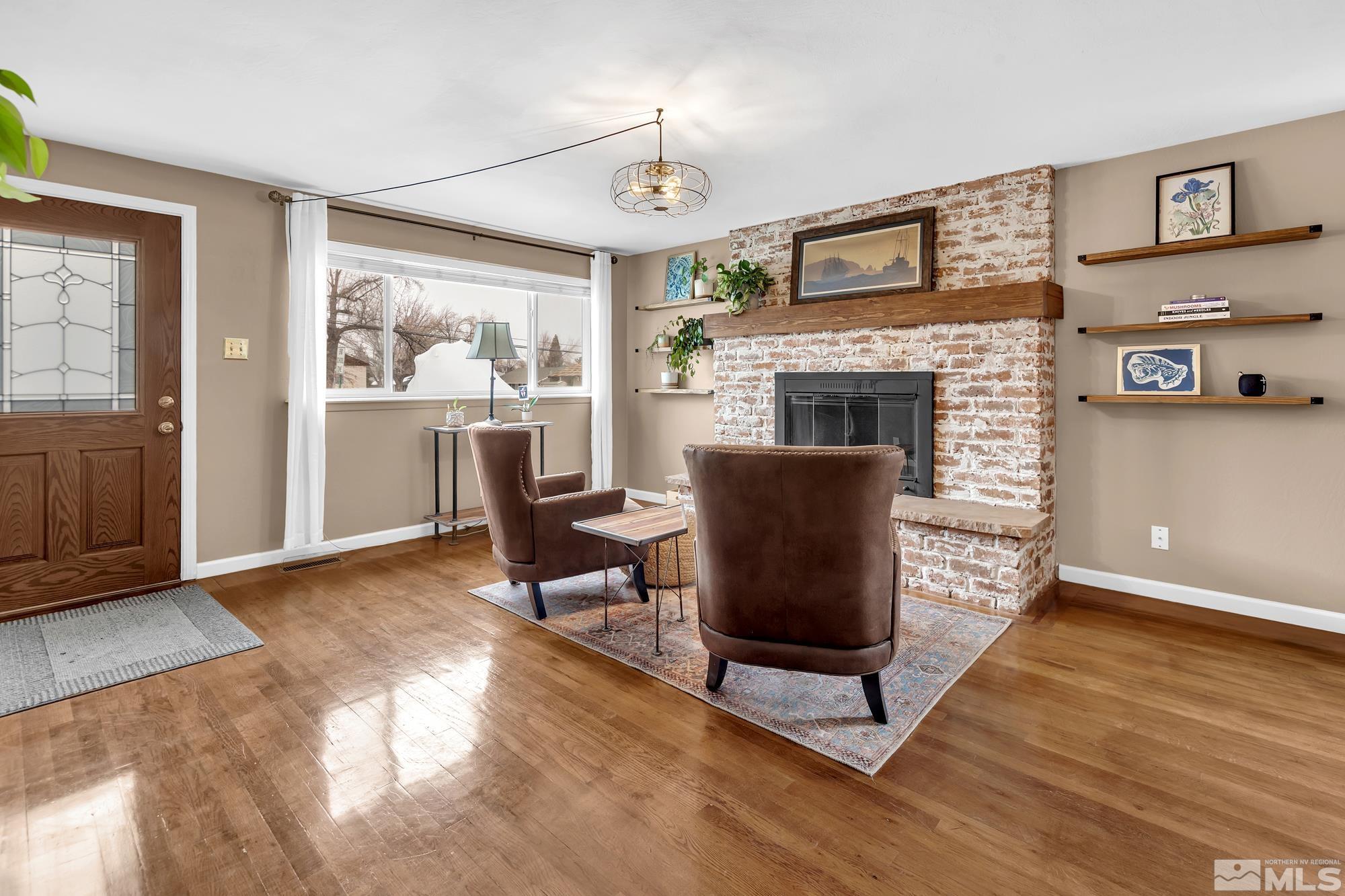 1830 West 7th Street Reno, NV 89503 - Photo 2 of 36 a living room with furniture and a fireplace