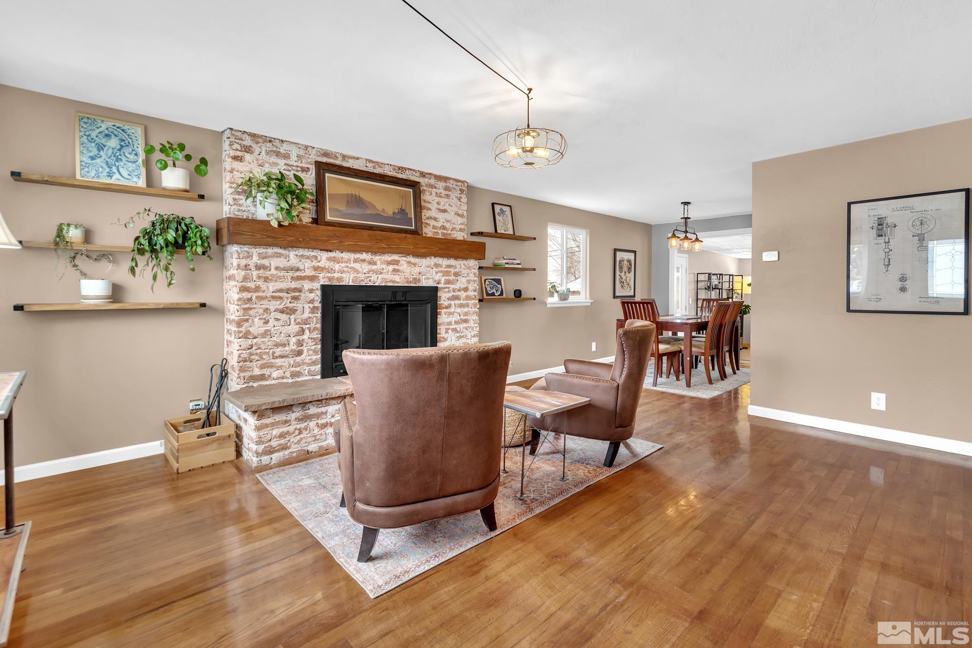 1830 West 7th Street Reno, NV 89503 - Photo 3 of 36 a living room with furniture and a fireplace