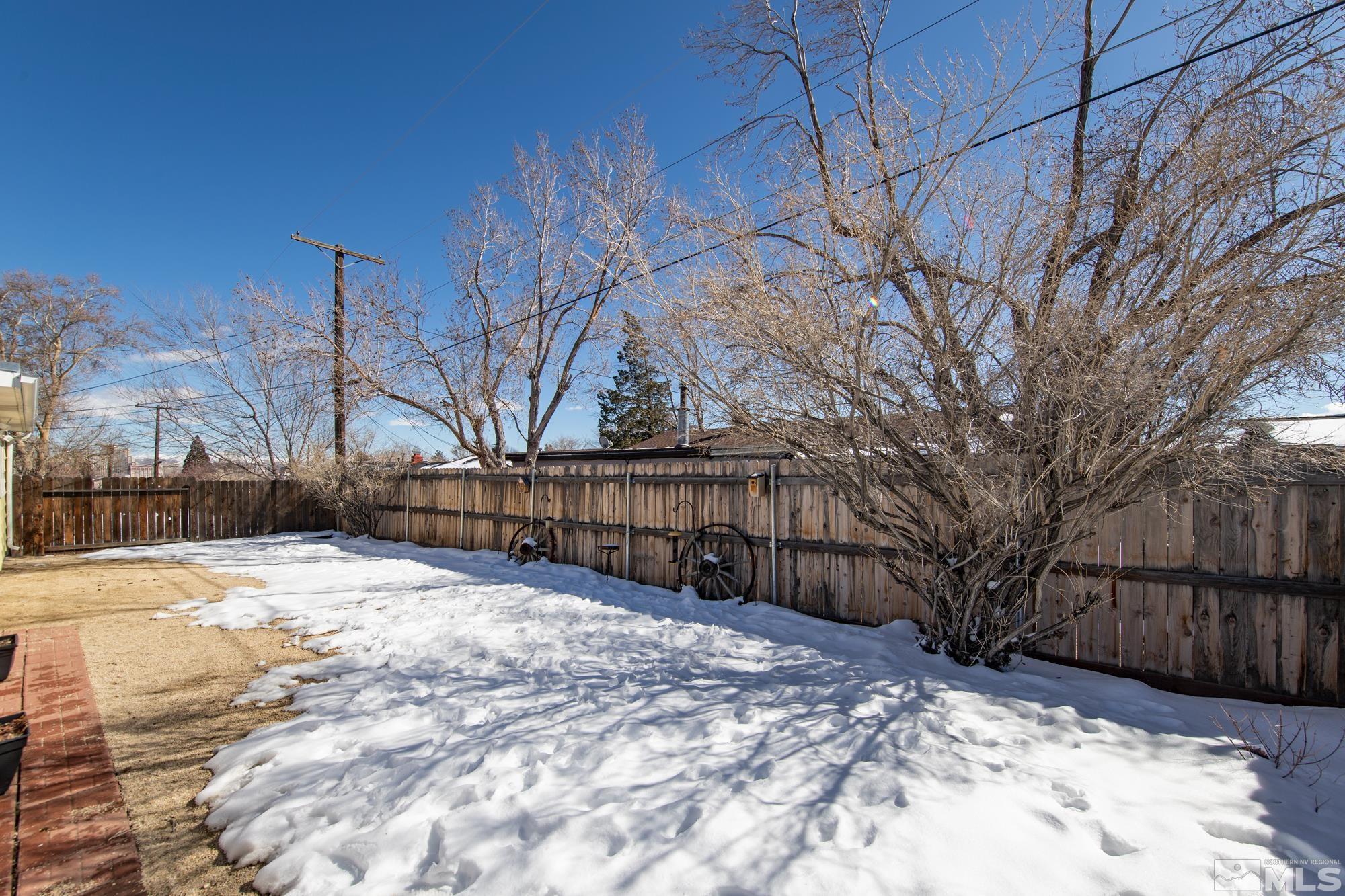 1830 West 7th Street Reno, NV 89503 - Photo 31 of 36 a view of backyard with wooden fence