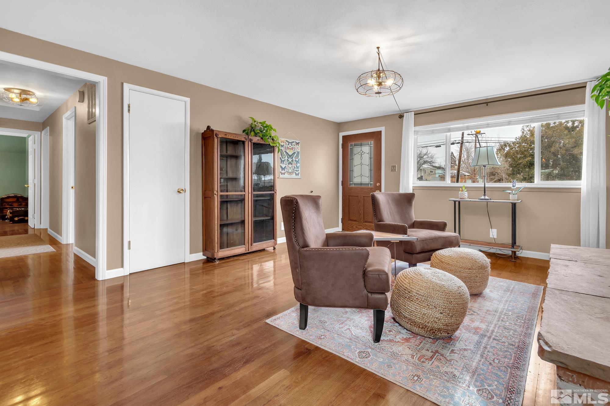 1830 West 7th Street Reno, NV 89503 - Photo 6 of 36 a living room with furniture and a large window