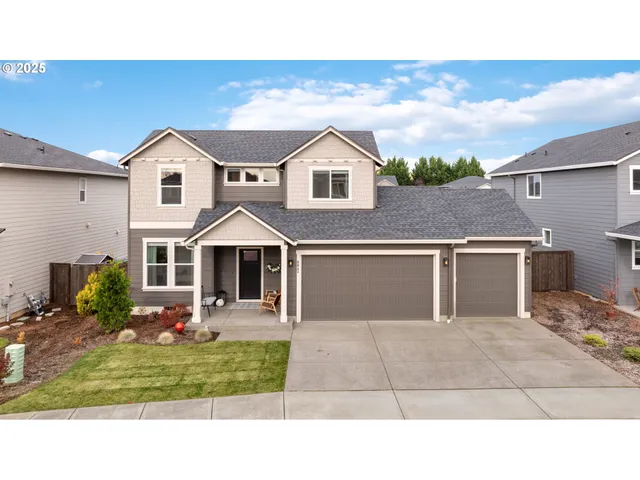 a house view with a garden space