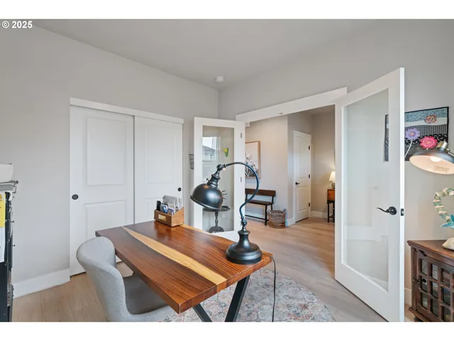 a living room with furniture and a table