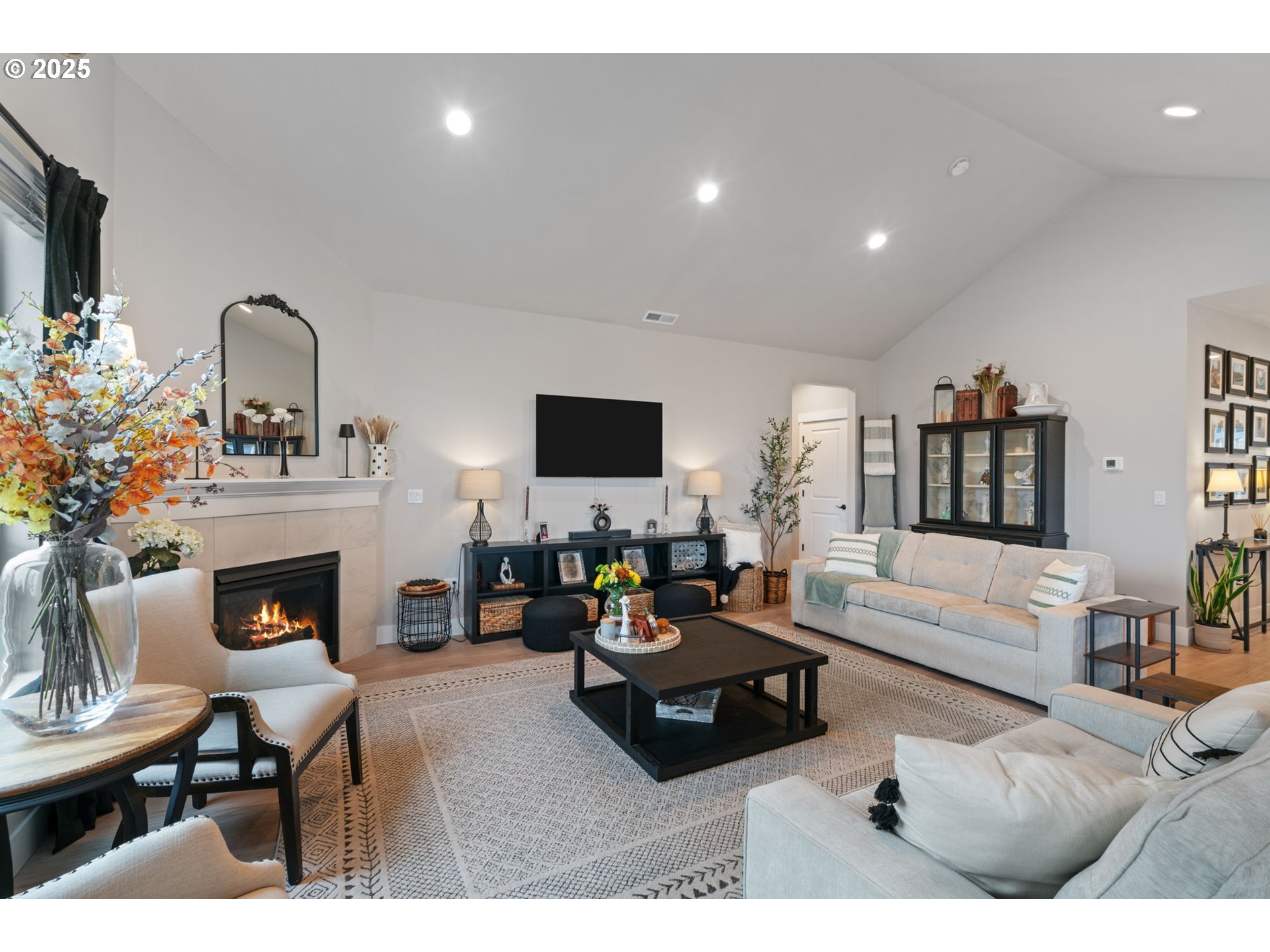 8842 North 3rd Circle Ridgefield, WA 98642 - Photo 16 of 46 a living room with furniture fireplace and flat screen tv