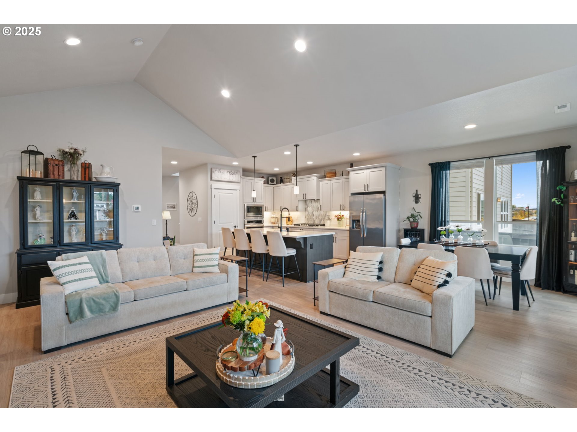 8842 North 3rd Circle Ridgefield, WA 98642 - Photo 17 of 46 a living room with furniture kitchen and a table