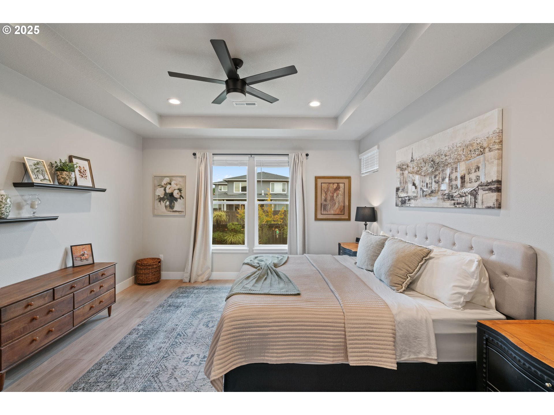8842 North 3rd Circle Ridgefield, WA 98642 - Photo 27 of 46 a bedroom with a large bed and a window