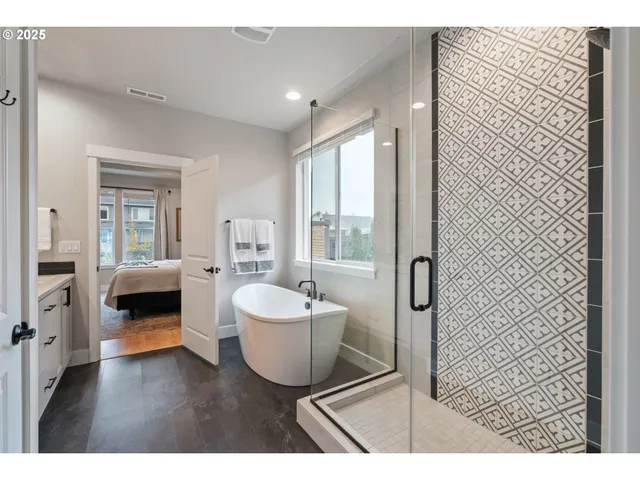 a en suite bathroom with a sink and a mirror