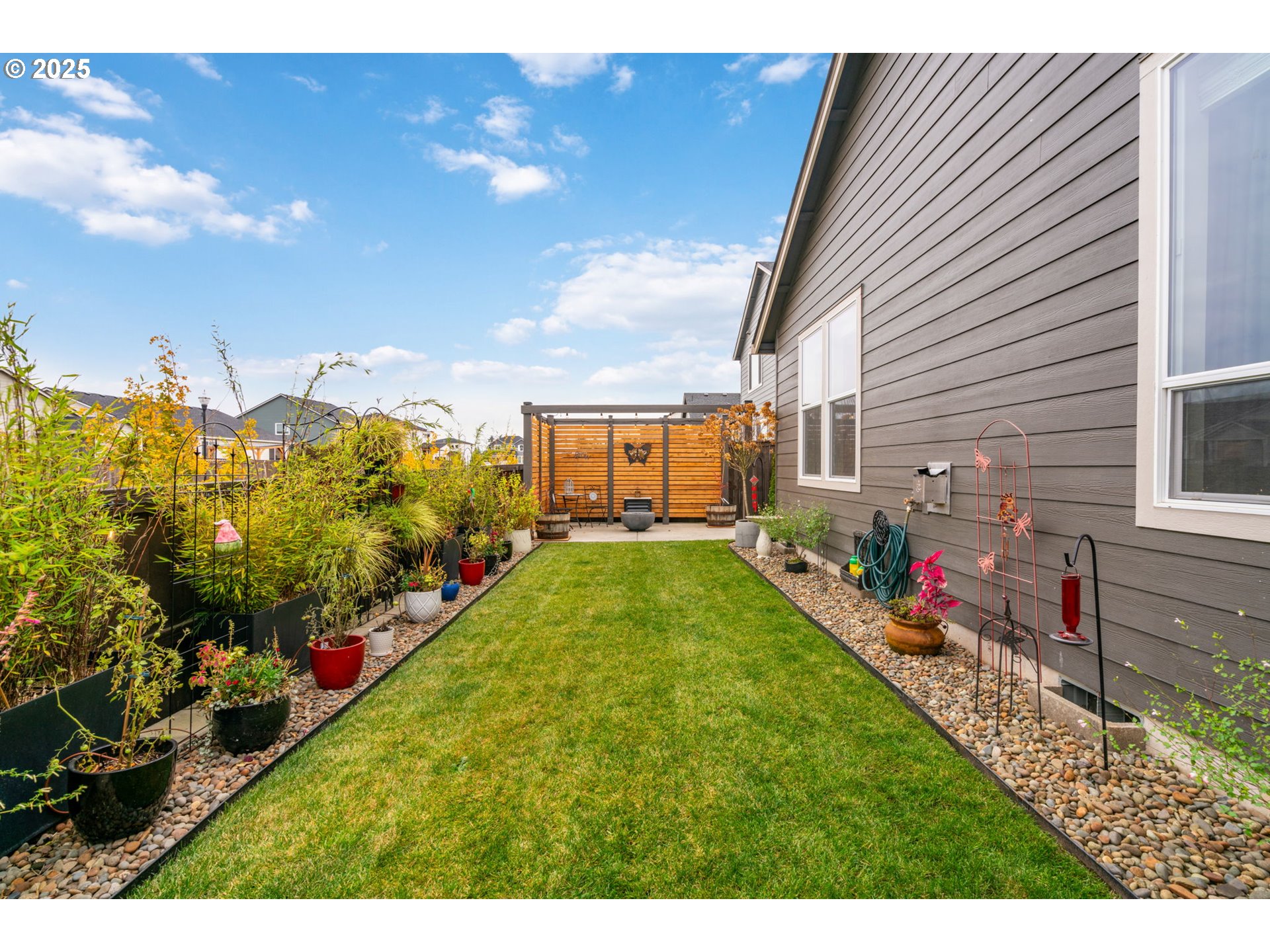 8842 North 3rd Circle Ridgefield, WA 98642 - Photo 43 of 46 a view of an house with backyard space and garden