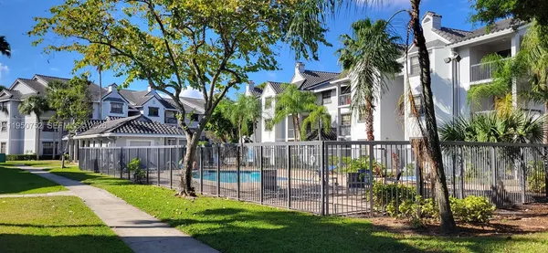 a view of swimming pool with a garden