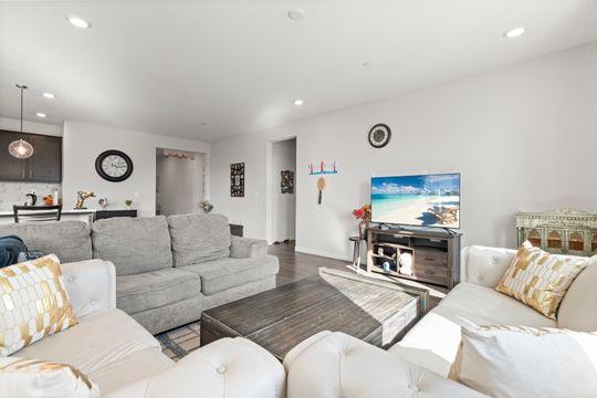 912 Loon Street Lathrop, CA 95330 - Photo 21 of 27 a living room with furniture and a flat screen tv