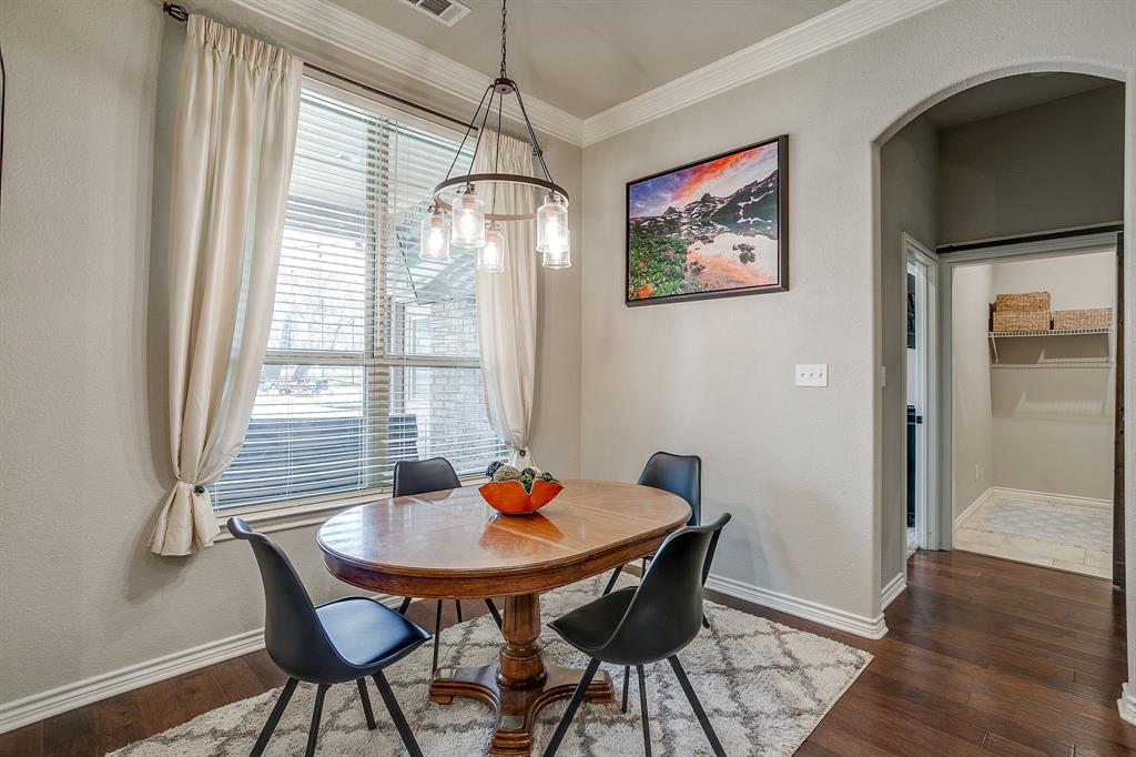 1615 Sanger Drive Springtown, TX 76082 - Photo 13 of 40 a view of a dining room with furniture window and wooden floor