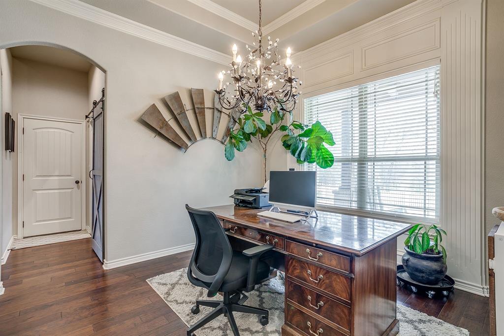1615 Sanger Drive Springtown, TX 76082 - Photo 14 of 40 a view of a workspace with furniture and a potted plant