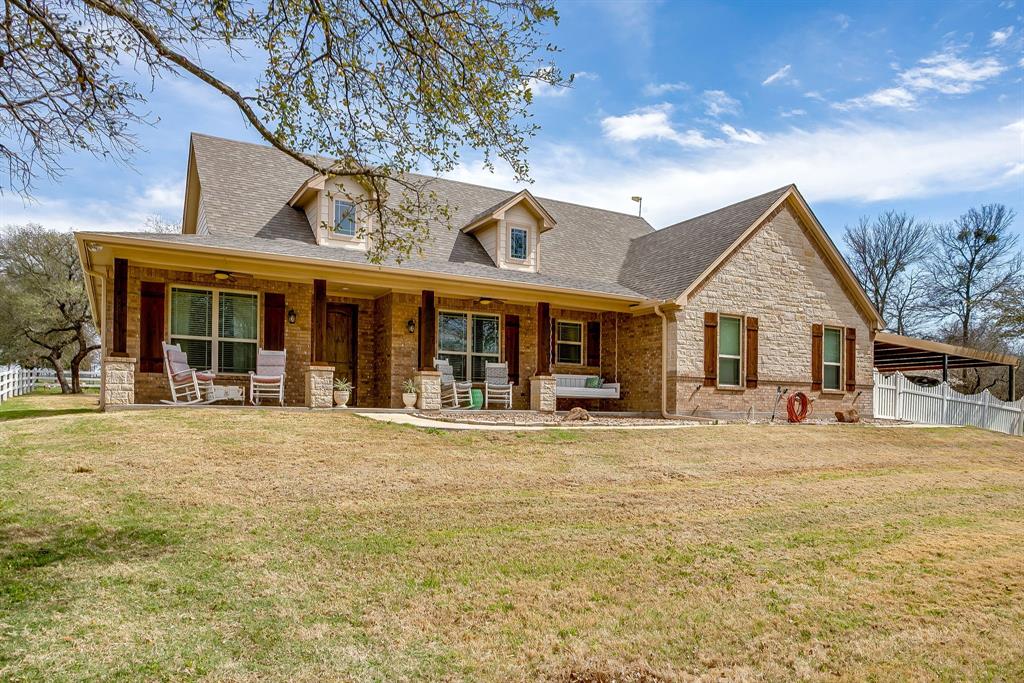 1615 Sanger Drive Springtown, TX 76082 - Photo 3 of 40 a house view with a outdoor space