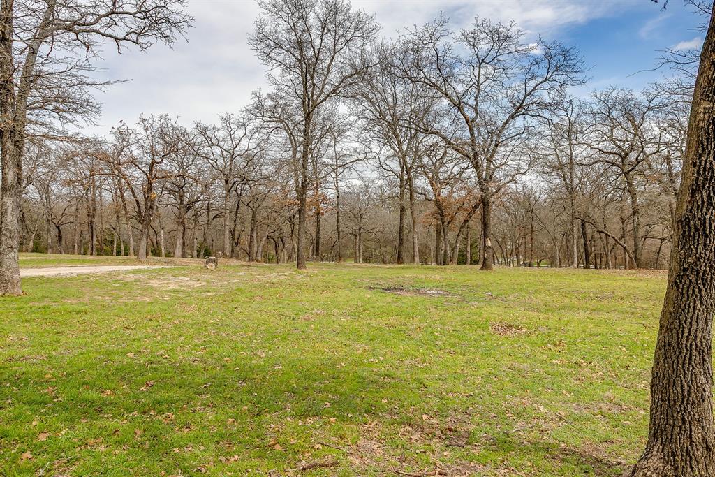 1615 Sanger Drive Springtown, TX 76082 - Photo 38 of 40 a view of swimming pool with an outdoor space