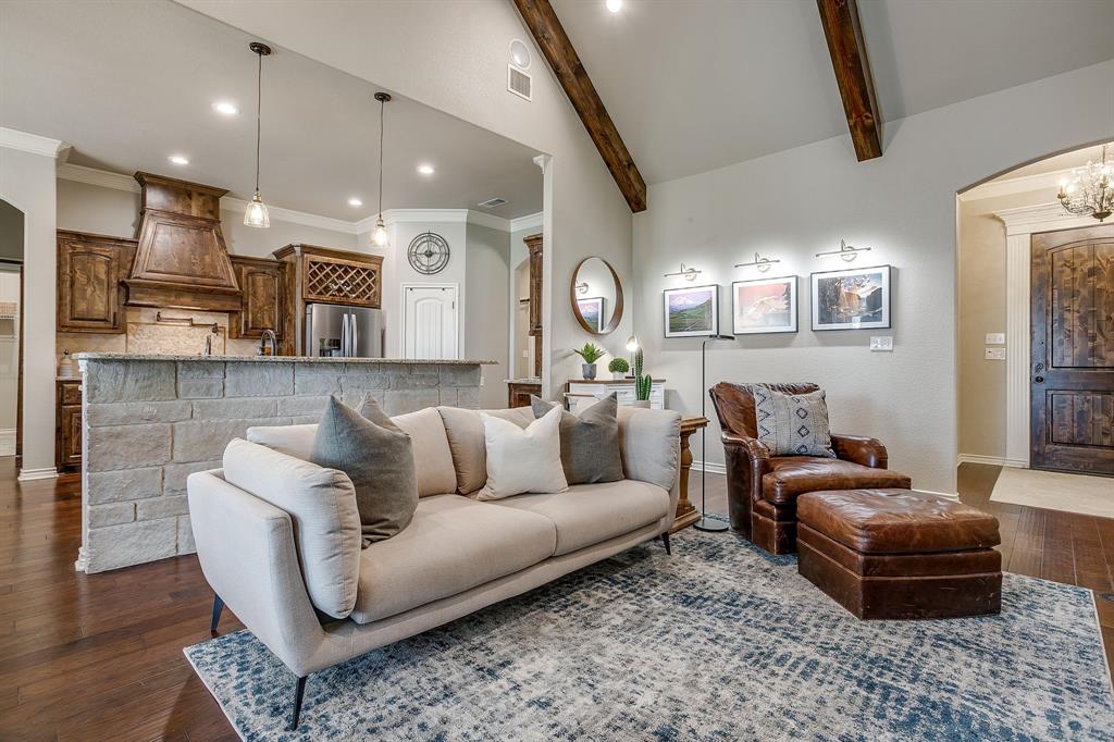 1615 Sanger Drive Springtown, TX 76082 - Photo 8 of 40 a living room with furniture and a wooden floor