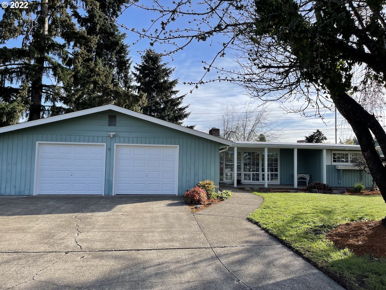 3203 Raleighwood Avenue Springfield, OR 97477 - Photo 1 of 28 a view of a house with a patio and a yard