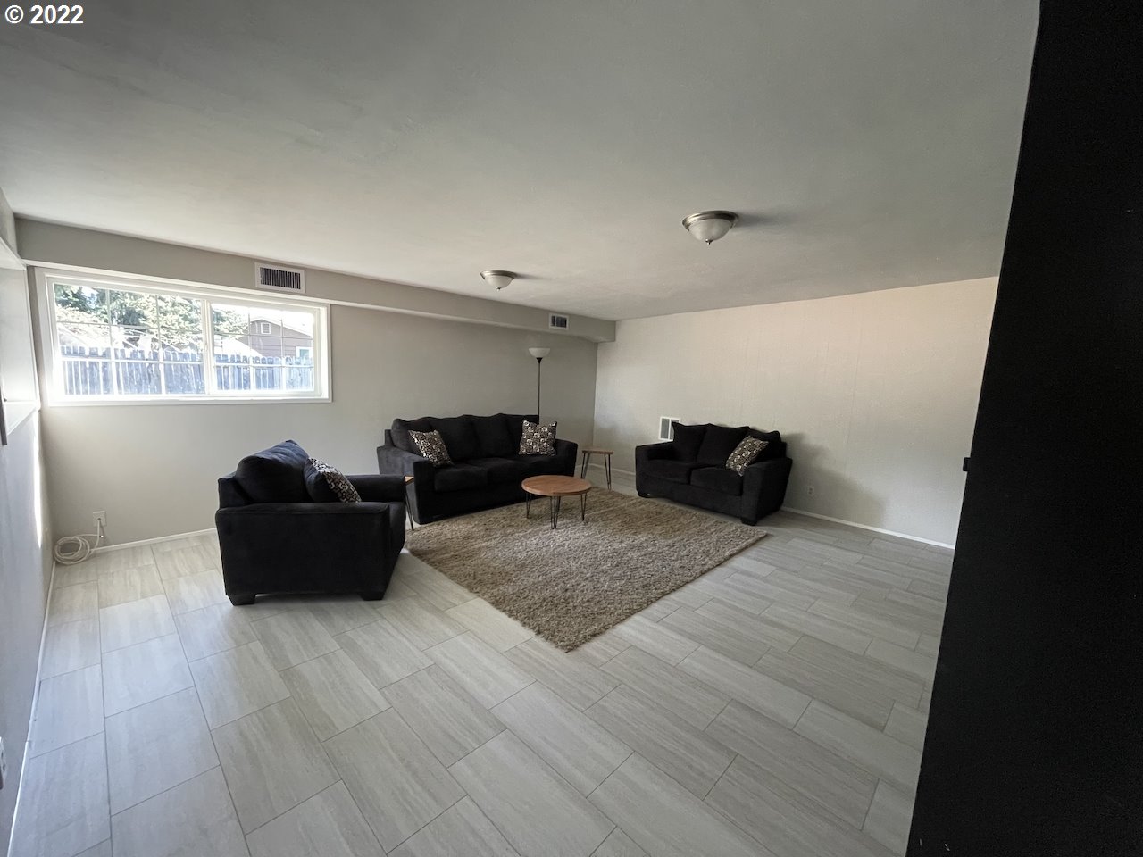 3203 Raleighwood Avenue Springfield, OR 97477 - Photo 13 of 28 a living room with furniture and a window