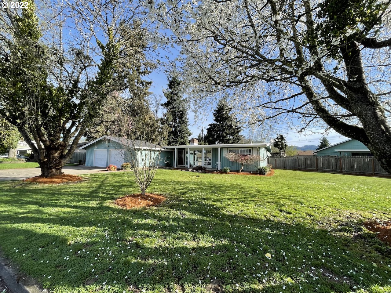 3203 Raleighwood Avenue Springfield, OR 97477 - Photo 27 of 28 a house that is sitting in the forest