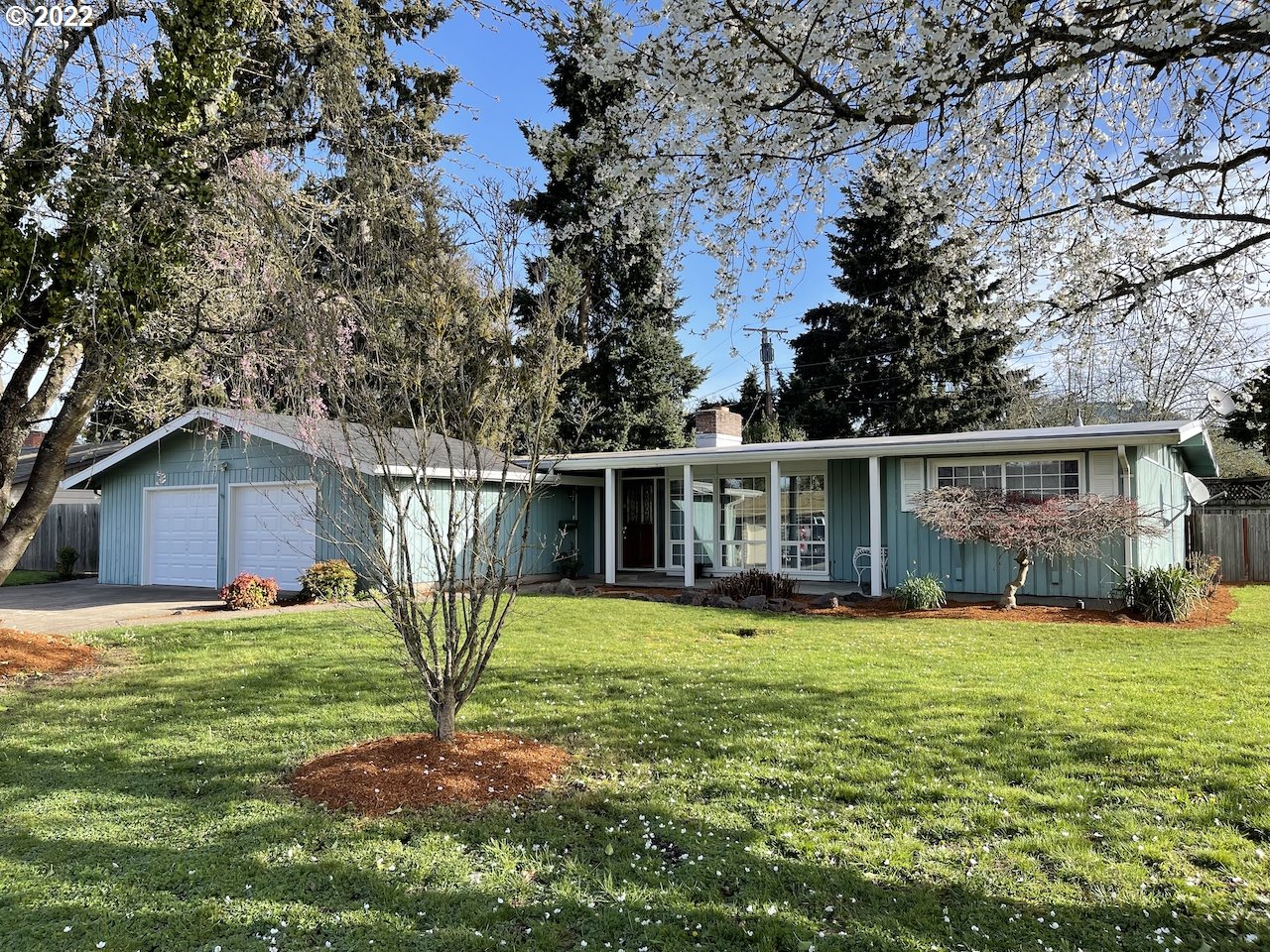 3203 Raleighwood Avenue Springfield, OR 97477 - Photo 3 of 28 a view of a house with a yard and sitting area