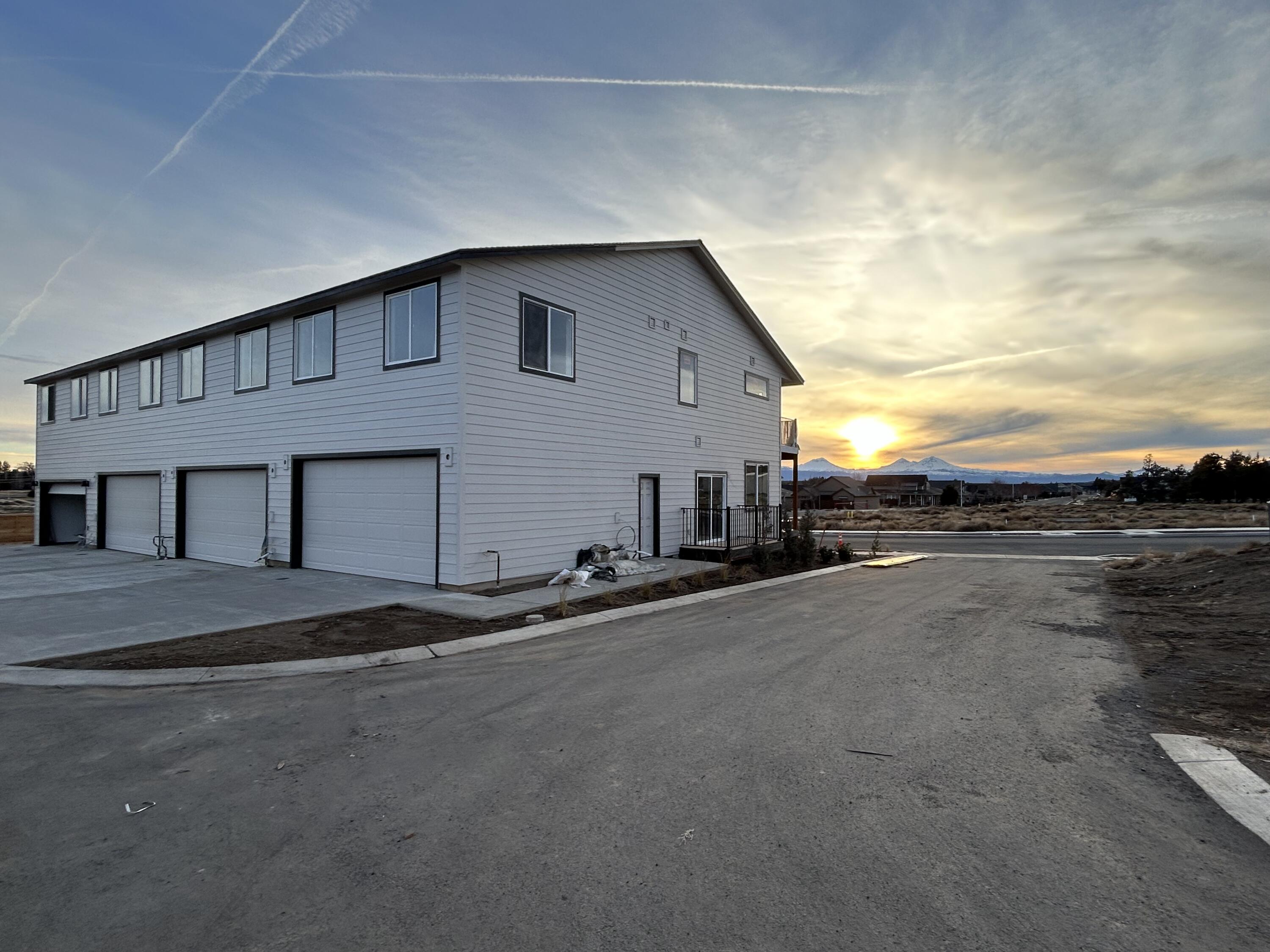4080 Southwest 39th Street, Unit LOT 30 Redmond, OR 97756 - Photo 28 of 38 Side view sunset