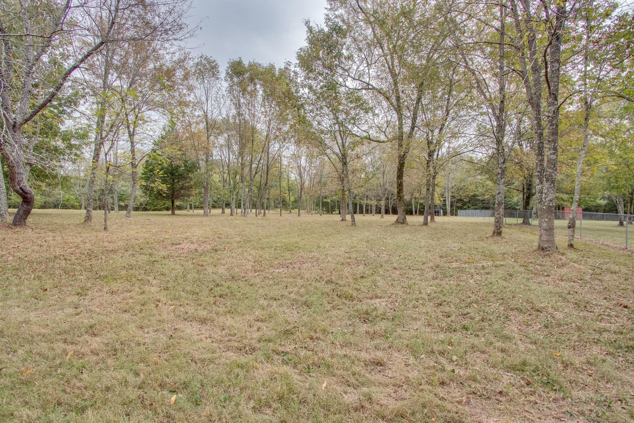 624 Speck Road Lebanon, TN 37087 - Photo 2 of 30 a view of a field with trees in the background