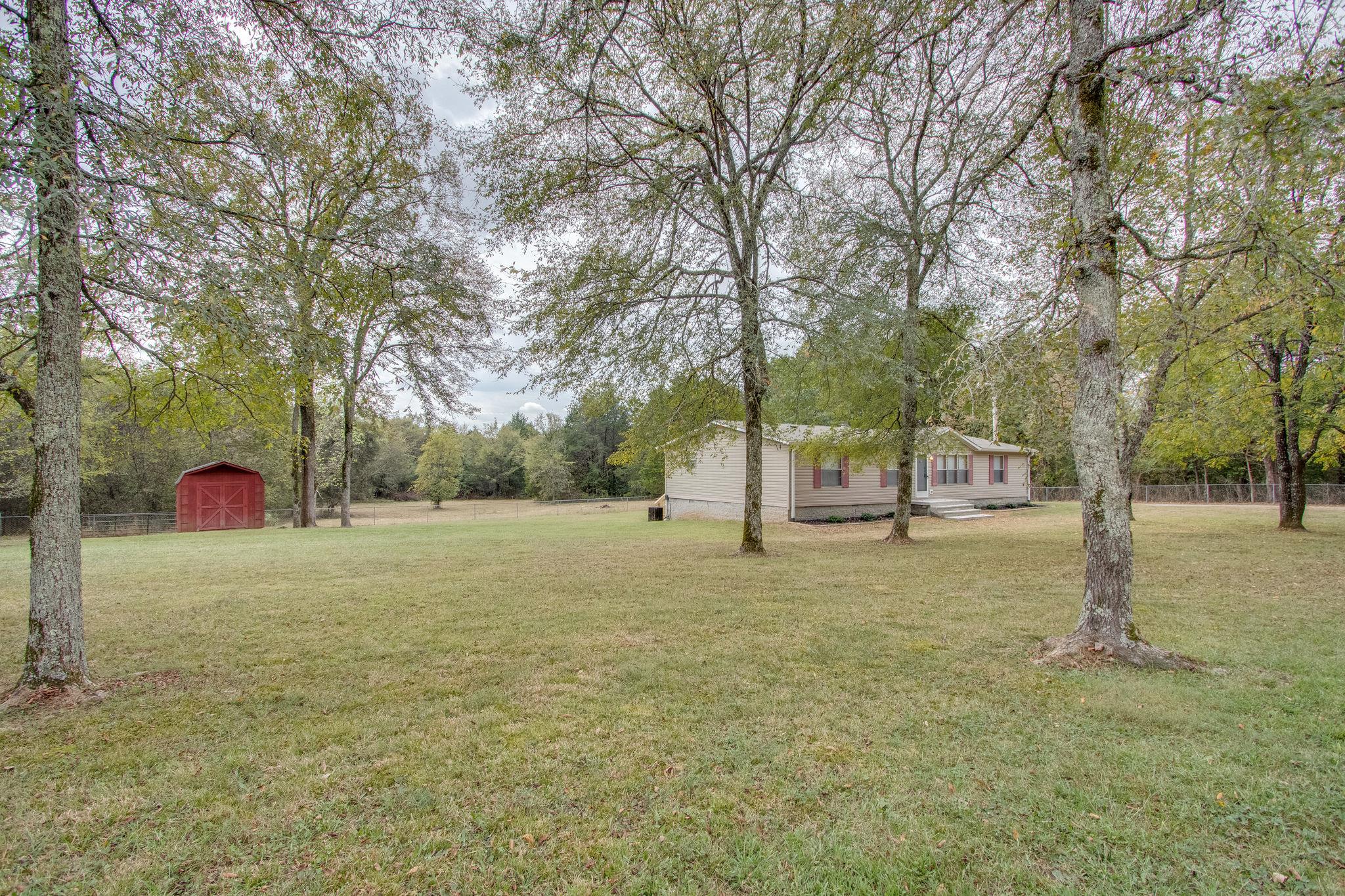 624 Speck Road Lebanon, TN 37087 - Photo 30 of 30 a house with trees in front of it